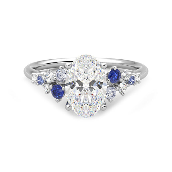 Oval Moissanite And Graduated Blue Sapphire Clusters Engagement Ring